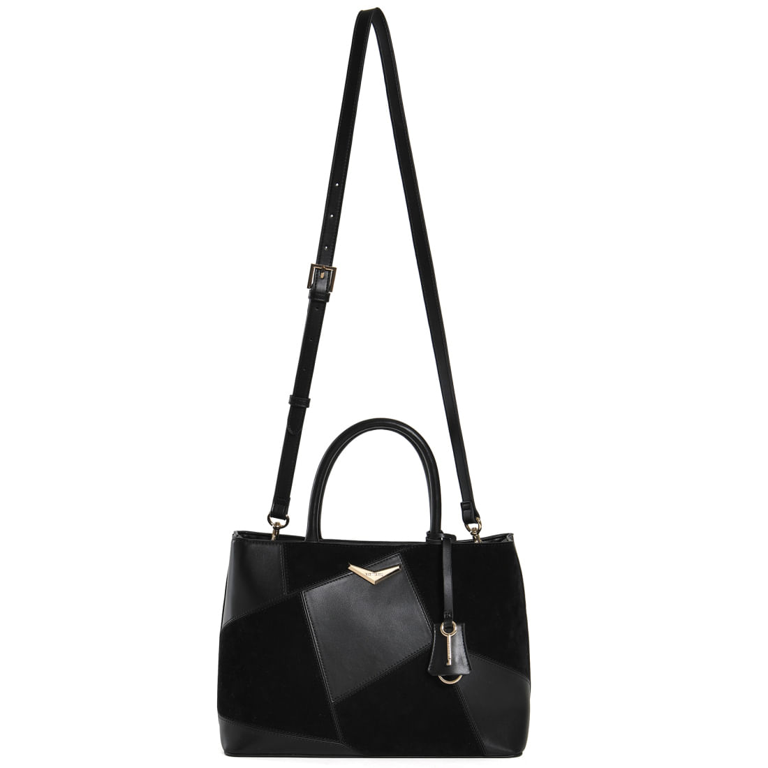 Bolsa Tote Via Marte preta em pé, mostrando design geométrico e detalhes dourados